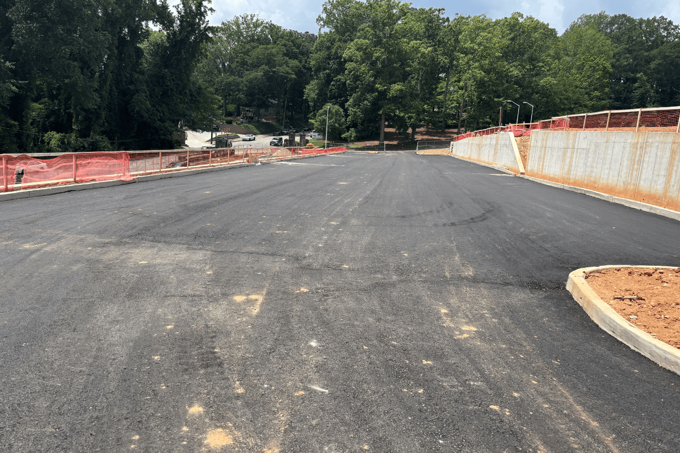 Construction progress on golf course parking lot.