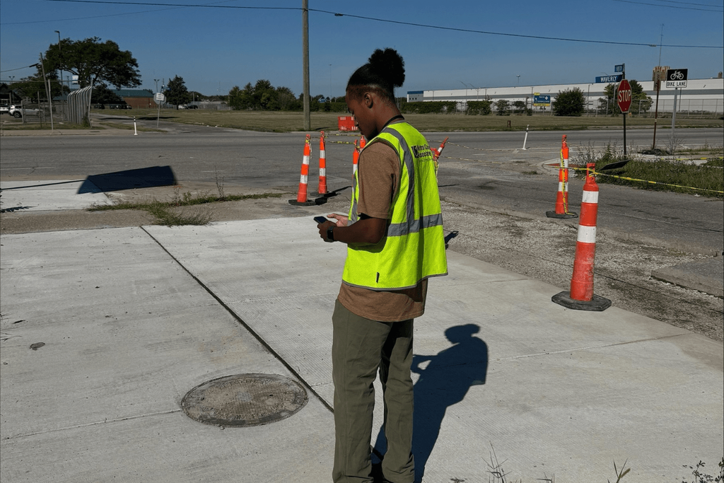 Field technician intern performing site visit.